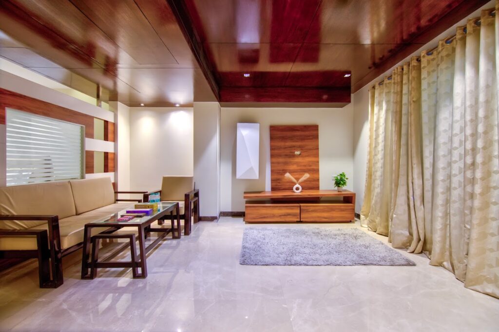 Spacious family suite with bedroom and living area at Hotel GreySky South Delhi